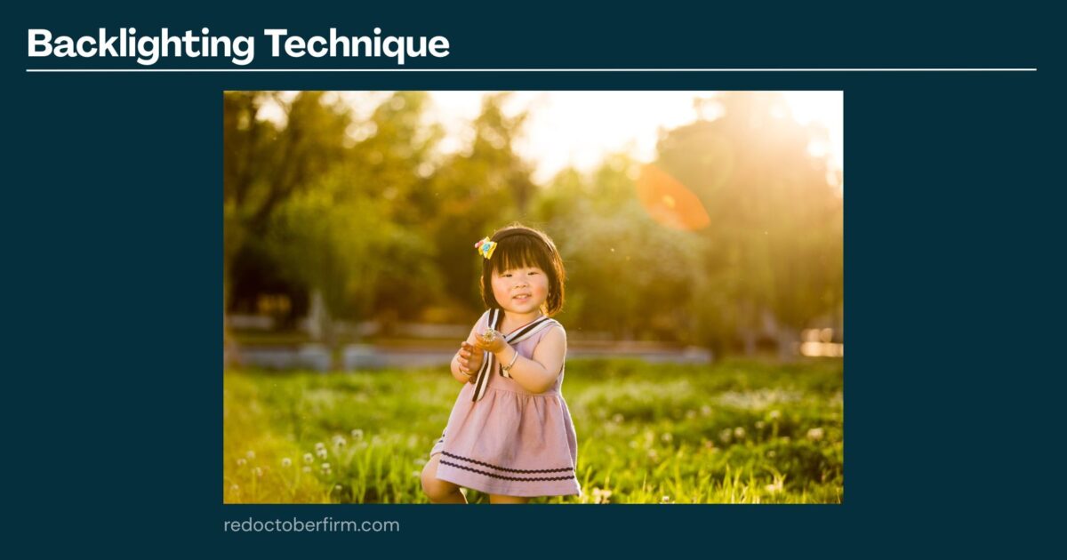 A Young Girl In A Pink Dress Stands On Grass Outdoors, Holding A Flower With Sunlight Behind Her, Demonstrating The Backlighting Photography Technique.