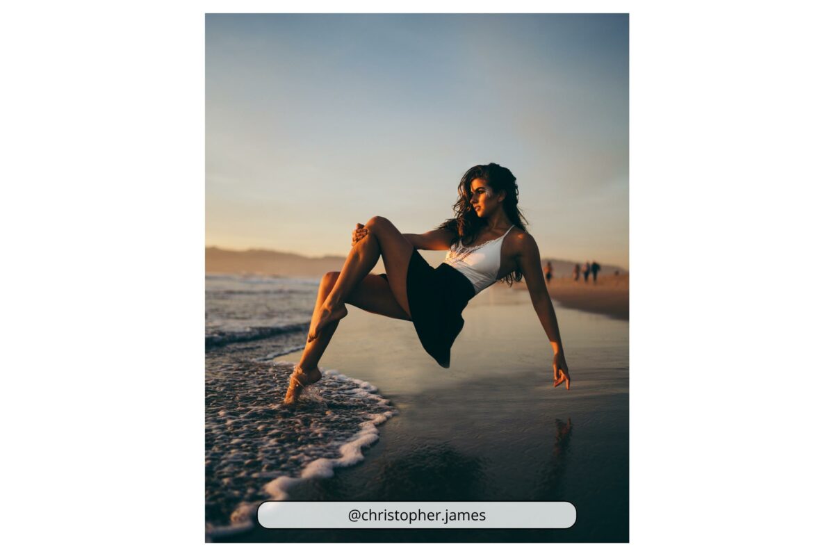 An Artistic Woman Doing A Flip On The Beach.