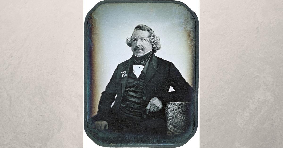 A Photograph Capturing A Man Seated.