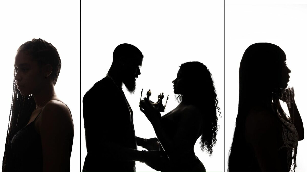 Professional Looking Silhouettes Of A Couple Holding Hands.